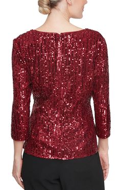 This petite blouse is crafted from our glamorous sequin fabric. Turn heads in this stretchy, 3/4 sleeve, V-neck blouse! The tie-waist detail adds a figure flattering effect. Pair with our black pant (style #26025) or our black skirt (style #26527) for a classy evening look. Petite Blouses, Sequin Blouse, Alex Evenings, Tie Front Top, Evening Look, Skirt Style, Sequin Fabric, Front Tie Top, V Neck Blouse