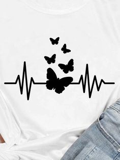 a white t - shirt with black butterflies on it and a heart beat line in the middle