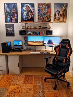 a desk with two computer monitors on it and a chair in front of the monitor