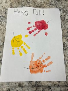 a handprinted card that says happy fall