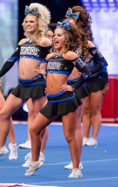 the cheerleaders perform for the crowd