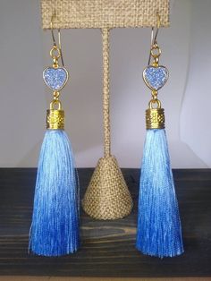 Gorgeous Baby Blue Heart Druzy Agate Quartz gold plated tassel dangle earrings. Earrings are 4 inches long. I can also change out ear wires for clip ons. Blue Long Drop Tassel Jewelry, Blue Tassel Jewelry Gift, Blue Tasseled Jewelry As Gift, Blue Tassel Jewelry As Gift, Blue Tasseled Jewelry For Gift, Blue Dangle Tassel Earrings As Gift, Blue Dangle Tassel Earrings For Gift, Blue Tassel Drop Earrings For Gift, Gift Long Drop Tassel Earrings