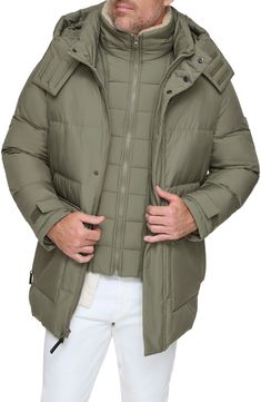 Stay cozy all winter in this parka that features a drawcord hood and a removable bib made with lustrous, lightweight down & feather fill. 33 1/2" length Stand collar; removable drawcord hood Adjustable hook-and-loop cuffs Water-resistant Lined, with down and feather fill 100% polyester Dry clean Imported Weatherproof Down Parka For Fall, Casual Down Parka With Detachable Hood, Functional Down Parka With Drawstring Hood, Down Parka With Detachable Hood, Outdoor Down Parka With Drawstring Hood, Cold Weather Down Parka With Drawstring Hood, Down Parka With Double-lined Hood, Weatherproof Down Parka, Green Parka Jacket