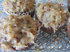 several muffins are sitting on a glass plate