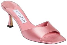 Luxury Pink Pointed Toe Mules, Luxury Pink Mules For Spring, Chic Pink Slip-on Slides, Luxury Pink Mules For Evening, Elegant Slides With Padded Block Heel, Elegant Pink Mules With Sculpted Heel, Pink Mules With Padded Open Heel, Chic Pink Mules With 4-inch Heel, Pink Evening Mules With Padded Heel