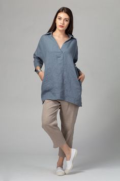 Get comfortable during all seasons in this handmade loose buttonless linen tunic. It features a deep V-neck finished in a shirt collar, concealed side pockets for added comfort and a convenient hip length that's easy to match with various types of bottoms.   FIT To choose the right size, check out our body and garments measurements charts displayed in the product listing photos. If you need specific sizing recommendations, please don't hesitate to contact us and we'll help you find the right fit Linen Tunic Shirt, Loose Fit Blouse, Kurta Neck Design, Linen Tunic, Linen Style, Linen Blouse, French Seam, Tunic Shirt, Shirt Collar