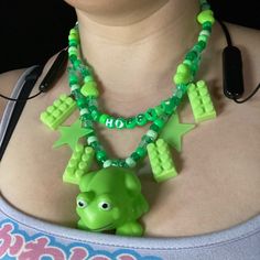 Feeling Hoppy? Or Maybe You Just Love Frogs? This Necklace Is For You! Features Squishy Frog Toy, Legos, And Glow In The Dark Stars. Length Is 19.5 Inches, But Can Be Made Longer. Fun Green Necklaces For Gift, Fun Green Necklace For Gift, Fun Green Necklaces For Gifts, Playful Green Necklace For Gift, Playful Green Necklace As Gift, Playful Green Necklaces For Gift, Playful Green Necklace For Gifts, Clowncore Jewelry, Frog Accessories Aesthetic