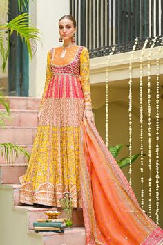 Yellow Slub Silk Dupatta With Dabka Work, Slub Silk Anarkali Set With Intricate Embroidery, Yellow Sheer Dupatta In Slub Silk, Yellow Sheer Slub Silk Dupatta, Orange Dola Silk Anarkali Set For Designer Wear, Designer Orange Dola Silk Anarkali Set, Unstitched Orange Anarkali Set For Festive Occasions, Orange Anarkali Set With Dupatta, Orange Bollywood Salwar Kameez For Seasonal Wear