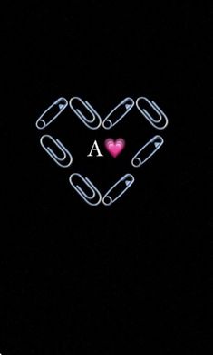 a black background with a heart and two links in the shape of a love letter