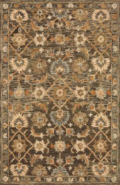 an area rug with brown and tan colors