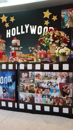 the hollywood sign is decorated with pictures and flowers on display in front of it's backdrop