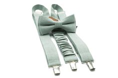 Elevate Your Look: Step into the spotlight with our sophisticated Dusty Sage Green Bow Tie and Suspender Set. Designed for those who appreciate a touch of elegance, this set is an ideal choice for weddings, formal events, or any occasion that calls for a refined appearance. Premium Quality: Crafted with attention to detail, the bow tie and suspenders boast high-quality fabric that ensures both comfort and durability. The dusty sage green hue adds a unique and stylish touch, perfect for complemen Elegant Adjustable Belts And Suspenders For Wedding, Dapper Suspenders For Wedding, Classic Fitted Belts And Suspenders For Wedding, Dapper Wedding Suspenders, Elegant Formal Belts And Suspenders With Ties, Classic Wedding Belts And Suspenders With Bow Tie, Toddler Bow Ties, Green Bow Tie, Baby Bowtie