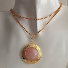 Photo necklace for women.  Rounded picture locket with rose quartz cabochon.  Photo locket necklace. Vintage locket. Picture necklace gift   This necklace measures 29" inches in length Fit 20 mm I include always a free surprise gift with every order All items are wrapped individually in a gift box Shipment arrives in 4 week by registered mail Contact me with any questions or requests, I'd be happy to help Pink Medallion Necklace For Gifting, Pink Medallion Jewelry As A Gift, Pink Medallion Jewelry Gift, Pink Medallion Jewelry For Gifts, Picture Locket, Picture Necklace, Photo Locket Necklace, Vintage Lockets, Photo Necklace