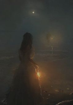 a woman standing in the dark holding a lantern