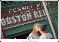 the boston red sox sign is painted on the side of a brick building in fenway park, home of the boston red sox