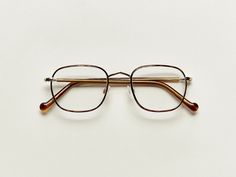 SCHLEP | Square Eyeglasses – MOSCOT NYC SINCE 1915 Downtown Nyc, Everyday Glasses, Gold Blonde, Lining Up, Nyc Aesthetic, Optical Shop, Iconic Buildings, Lower East Side, Gold Clips