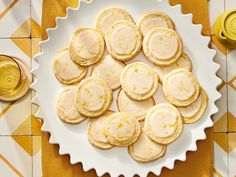 a white plate topped with lemon shortbread cookies