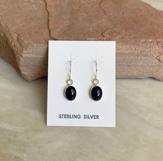 "Subtle, Southwestern, and versatile dangle earrings that are handcrafted by me! These earrings are comfortable and lightweight, making it ideal for everyday wear. They add a Southwestern vibe, making it a must have addition to your outfit! They can be easily paired with anything! The stone is Genuine Black Onyx. All findings are 925 sterling silver. Measurements: 1\" long with a 7x9mm genuine Black Onyx stone. The earrings are dangle earrings with an ear wire. Handcrafted in the USA. The earrin Black Artisan Earrings, Black Onyx Earrings, Rose Quartz Earrings, Black Onyx Stone, Onyx Earrings, Silver Dangle Earrings, Sterling Silver Dangle Earrings, Quartz Earrings, Onyx Stone