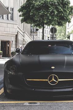 a black car parked in front of a building with the number 10 million on it