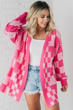 This Checked Out Cardigan is the perfect choice for fashionable and functional layering! Made from high quality and durable materials, it features a trendy check pattern with ribbed trim for extra style. This boyfriend fit cardigan is a must-have for any wardrobe. 83% Viscose 17% Nylon Ribbed Trim Finish Loose Fit Contrasting Grid sizes Exposed Seam Detail on Drop Shoulder Seam SIZE GUIDE & MEASUREMENTS: Model is 5'4", wears a size 3/5 and is modeling the small. More info here. Small 2-4 Medium Girly Business Casual, Checkered Cardigan, Velvet Holiday Dress, Outfits Colorful, Closet Candy Boutique, Drop Shoulder Cardigan, Flutter Dress, Fitted Cardigan, Plus Size Cardigans