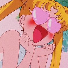 a cartoon girl with pink heart shaped glasses on her face