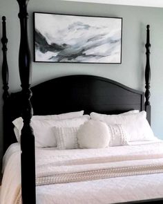 Abstract artwork is the best choice to decorate a room with a less personal appearance. Include these pieces in guest rooms when accessorizing the walls. The height of the bed posts gives the impression of an enclosed area, making the bed look and feel more cozy...   Image: stayawhile_mama