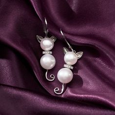 Ross-Simons - 7.5-9mm Cultured Pearl, Diamond-Accented Cat Drop Earrings in Silver. An RS exclusive. Meow! 7.5-9mm cultured freshwater pearl kitties shine in sterling silver with diamond accents. Hanging length is 1 5/8". Leverback, white pearl cat drop earrings. Pearl birthstones are the perfect gift for June birthdays. Elegant Silver Jewelry With Cat Design, Elegant Cat Design Jewelry For Anniversary, Elegant Silver Cat Design Earrings, Elegant White Jewelry With Cat Design, Elegant White Cat Design Jewelry, Drop Earrings Pearl, Pearl Birthstone, June Birthday, Earrings Pearl