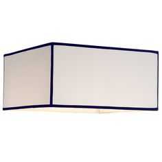 a white and blue lamp hanging from the ceiling with a square shade on it's side