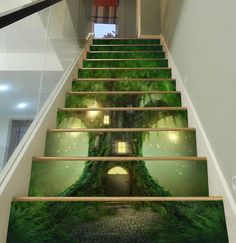 the stairs are decorated with green plants and trees