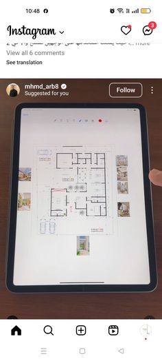 a person holding up an ipad with a floor plan on the screen and another hand pointing at it