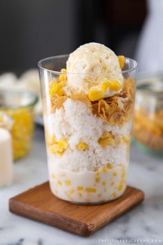 an ice cream sundae with corn kernels on top