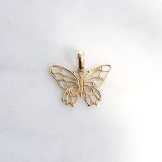 Just like the butterfly, you must leave the old behind to begin anew and soar. Give her the gift of wings with this beautiful butterfly necklace. DETAILS - 14k yellow gold butterfly VARIATIONS If you require any variation of this style (a different style chain, longer chain, etc.) feel free to message us. We will do our best to accommodate you. Additional costs may apply depending on the variation. POLICY We do accept returns on this item minus a $25 restocking fee. Return shipping is the respon Elegant 14k Gold Butterfly Jewelry, Elegant Butterfly Charms Jewelry, 14k Yellow Gold Butterfly Pendant Necklace, 14k White Gold Jewelry With Butterfly Charm, Dainty Butterfly Yellow Gold Jewelry, Delicate Yellow Gold Butterfly Pendant Necklace, Dainty Yellow Gold Butterfly Jewelry, Dainty 14k Gold Butterfly Jewelry, Dainty 14k Yellow Gold Butterfly Necklace