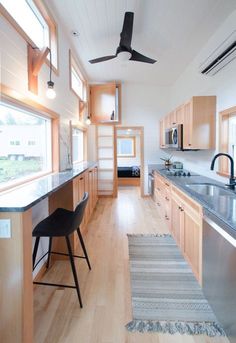 the kitchen is clean and ready to be used as a dining room or living area