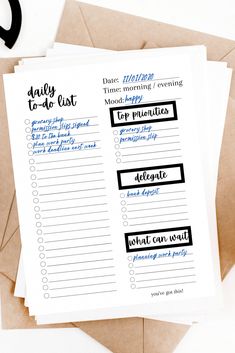 the printable daily to do list is on top of some envelopes