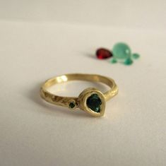 The Ring Made From 14 Karat Solid Yellow Gold. 1 Emeralds Pear Shape. The Size Of The Stone House 5.5x7mm. 1 Small Emerald 1.2mm. Beautiful 14k Yellow Gold Set With 2 Emeralds. A Wonderful Gift, Or Unique Engagement Ring. Material Available: 14/18/24k, Yellow/White/Rose Solid Gold. If You Want A Custom Ring Please Contact Me Before Purchase. When I Write Handmade I Really Mean It. Each Piece Is Hand-Made With Great Pleasure And Love. I Love To Make Jewelry. Gold Ring With Emerald, Ring With Emerald, Unique Engagement Ring, Make Jewelry, Custom Ring, Yellow Gold Setting, Stone House, Mean It, 14k Gold Ring