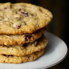 a stack of cookies sitting on top of a white plate