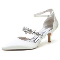 a pair of women's white shoes with jeweled straps and ankle straps