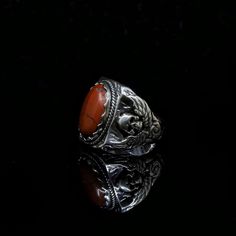 Charm Skull Jewelry , Silver Oval Red Jasper Gemstone Ring , Gift for Boyfriend , Birthday Gift 𝐈𝐭𝐞𝐦 𝐍𝐚𝐦𝐞 : 𝐒𝐤𝐮𝐥𝐥 𝐗 𝐉𝐚𝐬𝐩𝐞𝐫 ✦𝐦𝐞𝐚𝐧𝐢𝐧𝐠 𝐨𝐟 𝐆𝐞𝐦𝐬𝐭𝐨𝐧𝐞 : Jasper is regarded as a gemstone that gives a sense of well-being, intensifying that feeling. Red jasper has been used as a stone of protection for thousands of years. It is believed this jasper has an ability to create and help balance aggressive, dynamic energy. ✔ ᴘʀᴏᴅᴜᴄᴛ ɪɴғᴏʀᴍᴀᴛɪᴏɴ  ✔  𝐰𝐞𝐢𝐠𝐡𝐭 𝐨𝐟 𝐭𝐡𝐞 𝐫𝐢𝐧𝐠       :  𝟑𝟖 𝐆𝐑  ✔  𝐝𝐢𝐚𝐦𝐞𝐭𝐞𝐫 𝐨𝐟 𝐭𝐡𝐞 𝐫𝐢𝐧𝐠   :  𝟐𝟔,𝟐𝟏𝐦𝐦  𝐡𝐞𝐢𝐠𝐡𝐭 𝐨𝐟 𝐭𝐡𝐞 𝐫𝐢𝐧𝐠        :  𝟐𝟐,𝟏𝐦𝐦  𝐭𝐡𝐢𝐜𝐤𝐧𝐞𝐬𝐬 𝐨𝐟 𝐭𝐡𝐞 𝐫𝐢𝐧𝐠  :   𝟕𝐦𝐦    𝐆𝐞𝐦𝐬𝐭𝐨𝐧𝐞 𝐂𝐨𝐥𝐨𝐮𝐫 : 𝐑𝐞𝐝   𝐆𝐞𝐦𝐬𝐭𝐨𝐧𝐞 𝐓𝐲𝐩𝐞 : 𝐑𝐞𝐝 𝐉𝐚𝐬𝐩𝐞𝐫 ✔𝐖𝐞 𝐜𝐚 Adjustable Vintage Skull Ring Gift, Vintage Engraved Skull Ring For Gift, Handmade Bohemian Skull Ring For Gift, Handmade Bohemian Skull Ring As Gift, Gemstone Skull Ring Gift, Jasper Meaning, Husband Birthday Gift, Bold Statement Jewelry, Aesthetic Jewelry