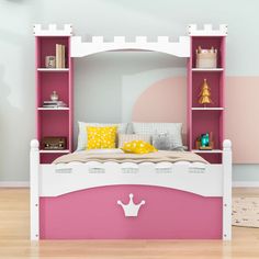 a child's bedroom with pink and white furniture