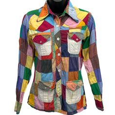 Vintage 70s Patchwork Womens Button Front Shirt Small Hippy Hippie Multicolor Colorblock Premier Fashion Creation Pockets Long Sleeve Button Up Button Down CONDITION: Has spots, holes, and some repaired holes. Tag is a Large but I feel it measures more similar to a modern Small. Check measurements to ensure fit. Has been washed and is ready to be worn. See photos. SIZE AND MEASUREMENTS: Womens Small Width 17" - Underarm to underarm Length 24" - From the back, measure base of collar to the bottom Affordable Multicolor Patchwork T-shirt, Cheap Collared Patchwork Blouse, 70s Patchwork, Womens Blouses, Button Front Shirt, Vintage 60s, Feel It, Blue Shirt, Vintage 70s