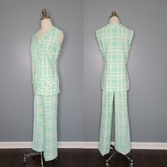 "This 60s era mint and white Stockton set is DIVINE! It comes in a thick textured polyester fabric featuring a mint and white geometric print. The v-neck sleeveless top features five front buttons and two front faux pockets. The wide leg pants have an elastic waistband and a front crease.  100% Encron Polyester Condition: PRISTINE vintage condition! Please view all pictures carefully as all vintage items are sold as is. Label: Stockton  Label Size: None- No size labels were attached-Please see detailed measurements. I would estimate the pants as a size Small and the shirt as a Medium.  Top Measurements: Bust: 42\" Waist: 38\" Length: 28\" Pants Measurements: Waist: 30\" (Elastic waistband at rest). Hips: 40\" Length: 42\" For more vintage and handmade women's and children's clothing please Fitted Green V-neck Sets, White V-neck Workwear Sets, White V-neck Sets For Workwear, Retro Spring Workwear Sets, Retro Workwear Sets For Spring, Pantalon Large, Geometric Print, Suits For Women, Childrens Clothes