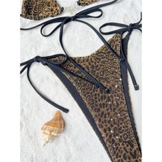 Features: This three-piece bikini set is perfect for any beach day. Its leopard halter top provides support and style, while the high cut bottoms elongate your legs. The included skirt adds a touch of flair to this feminine swimwear. Make a statement with Sheila With Skirt Leopard Halter High Cut Bikini. Party Vacation Swimwear With Tie-side Bottom, Party Swimwear For Vacation With Tie-side Bottom, Leopard Print Halter Neck Swimwear For Swimming, Leopard Print Beachwear Swimwear For Sunbathing, Leopard Print Beachwear For Sunbathing, Leopard Print Stretch Swimwear For Sunbathing, Stretch Leopard Print Swimwear For Sunbathing, Summer Leopard Print Swimwear For Beach Season, Summer Party Leopard Print Bottoms