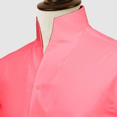 "High Open Collar Full Sleeves Shirt Tailor-Made On Order shirt 𝘈 𝘩𝘪𝘨𝘩 𝘤𝘰𝘭𝘭𝘢𝘳 𝘴𝘩𝘪𝘳𝘵 𝘪𝘴 𝘢 𝘤𝘭𝘢𝘴𝘴𝘪𝘤 𝘢𝘯𝘥 𝘵𝘪𝘮𝘦𝘭𝘦𝘴𝘴 𝘴𝘵𝘺𝘭𝘦 𝘵𝘩𝘢𝘵 𝘢𝘥𝘥𝘴 𝘢 𝘵𝘰𝘶𝘤𝘩 𝘰𝘧 𝘴𝘰𝘱𝘩𝘪𝘴𝘵𝘪𝘤𝘢𝘵𝘪𝘰𝘯 𝘵𝘰 𝘢𝘯𝘺 𝘰𝘶𝘵𝘧𝘪𝘵. 𝘛𝘩𝘪𝘴 𝘴𝘵𝘺𝘭𝘦 𝘧𝘦𝘢𝘵𝘶𝘳𝘦𝘴 𝘢 𝘤𝘰𝘭𝘭𝘢𝘳 𝘵𝘩𝘢𝘵 𝘴𝘵𝘢𝘯𝘥𝘴 𝘶𝘱 𝘢𝘯𝘥 𝘦𝘯𝘤𝘪𝘳𝘤𝘭𝘦𝘴 𝘵𝘩𝘦 𝘯𝘦𝘤𝘬, 𝘱𝘳𝘰𝘷𝘪𝘥𝘪𝘯𝘨 𝘢 𝘳𝘦𝘧𝘪𝘯𝘦𝘥 𝘢𝘯𝘥 𝘱𝘰𝘭𝘪𝘴𝘩𝘦𝘥 𝘭𝘰𝘰𝘬. 𝘐𝘵'𝘴 𝘢 𝘷𝘦𝘳𝘴𝘢𝘵𝘪𝘭𝘦 𝘱𝘪𝘦𝘤𝘦 𝘰𝘧 𝘤𝘭𝘰𝘵𝘩𝘪𝘯𝘨 𝘵𝘩𝘢𝘵 𝘤𝘢𝘯 𝘣𝘦 𝘸𝘰𝘳𝘯 𝘸𝘪𝘵𝘩 𝘢 𝘴𝘶𝘪𝘵 𝘧𝘰𝘳 𝘧𝘰𝘳𝘮𝘢𝘭 𝘰𝘤𝘤𝘢𝘴𝘪𝘰𝘯𝘴 𝘰𝘳 𝘥𝘳𝘦𝘴𝘴𝘦𝘥 𝘥𝘰𝘸𝘯 𝘸𝘪𝘵𝘩 𝘫𝘦𝘢𝘯𝘴 𝘧𝘰𝘳 𝘢 𝘤𝘢𝘴𝘶𝘢𝘭 𝘭𝘰𝘰𝘬. 𝘛𝘩𝘦 𝘩𝘪𝘨𝘩 𝘤𝘰𝘭𝘭𝘢𝘳 𝘢𝘭𝘴𝘰 𝘰𝘧𝘧𝘦𝘳𝘴 𝘢𝘥𝘥𝘪𝘵𝘪𝘰𝘯𝘢𝘭 𝘤𝘰𝘷𝘦𝘳𝘢𝘨𝘦 𝘢𝘯𝘥 𝘱𝘳𝘰𝘵𝘦𝘤𝘵𝘪𝘰𝘯 𝘢𝘨 Formal Shirt With Stand Collar For Spring, Formal Spring Shirt With Stand Collar, Classic Summer Shirt With Stand Collar, Semi-formal Fitted Top With Stand Collar, Classic Shirt With Stand Collar For Spring, Fitted Shirt With Stand Collar And Buttons, Pink Collared Shirt For Formal Occasions, Formal Pink Collared Shirt, Pink Semi-formal Shirt With Spread Collar