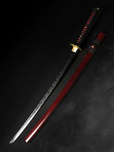 two red and black swords on a black background