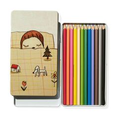 a set of colored pencils with a wooden case