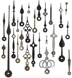 an assortment of various metal objects hanging from the ceiling