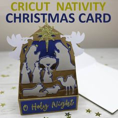 a nativity christmas card with an ornament