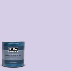 the behr paint is light gray and it has a white base with black lettering