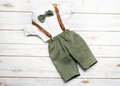 Olive green pure linen straight cut pants, Set available with suspenders, bowtie and pure linen white shirt for baby boy 0-2T.  Can be bought separately.  For weddings, anniversaries, parties, other occasions. You can choose any other colors for pants and shirt, see image for linen color choices. Please note them in the personalization field. Extra fees for long sleeves, see 2 options available that you can add to your cart. The cap is usually made of the same color as the set, but you could choose separate colors for different items. You would like to change the color of the pants, bow tie & cap for another color (see color options picture)? No problem at all! :) Please note that the set on the picture is a 0-3M, the pants may look like shorts, but they are pants ;) And you can send me a Linen White Shirt, Green Suspenders, Olive Green Weddings, Straight Cut Pants, Baby Boy Dress, Leather Suspenders, Linen Color, Linen White, Green Baby