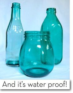 three blue glass jars sitting next to each other on a white tablecloth with the words and it's water proof